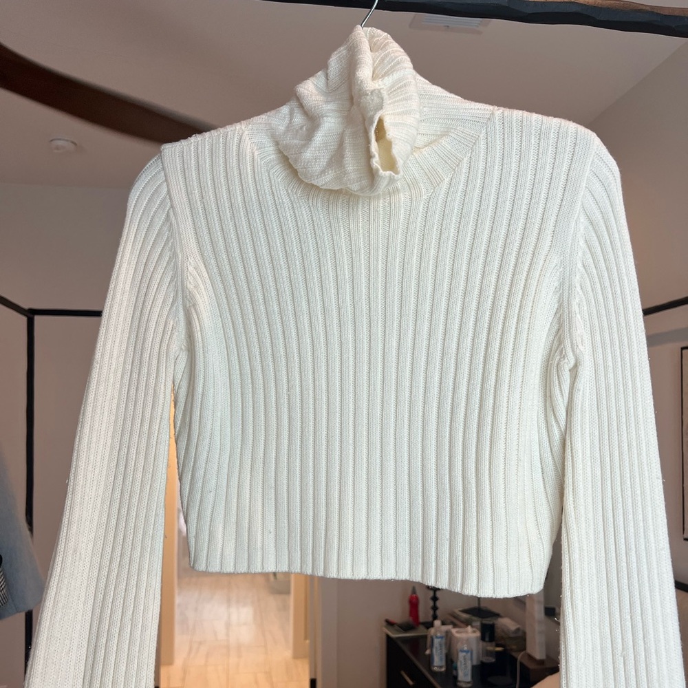 White cropped sweater. Turtleneck